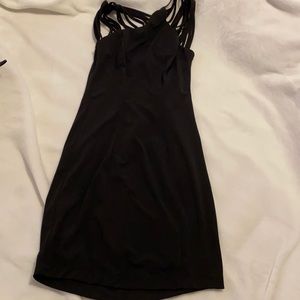 Black mini dress with multi strap top!
